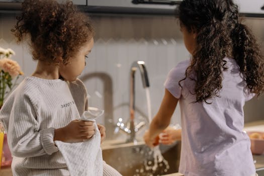 toddler helping with chores