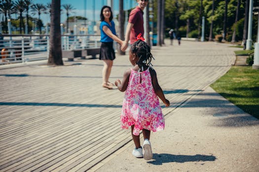 Parents enjoying a nature walk with their toddler