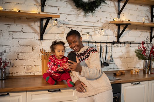 happy mother with toddler during online workshop