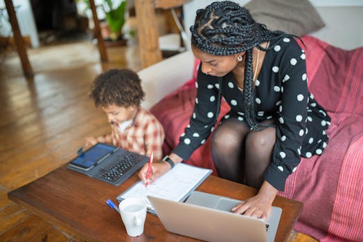 image of a working mother juggling tasks