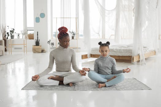 parent and child doing yoga together