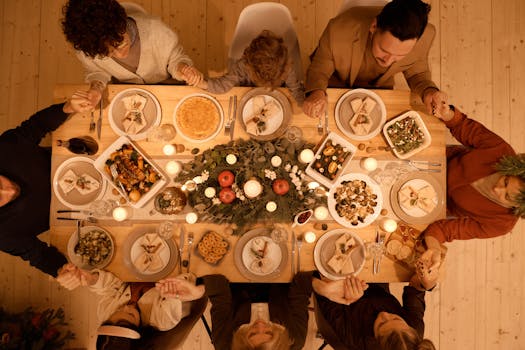 Family sitting down to dinner together