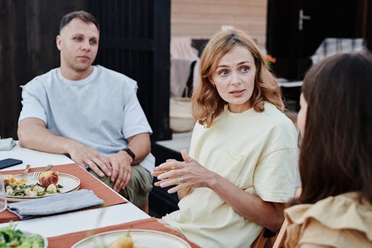 family enjoying a picnic dinner